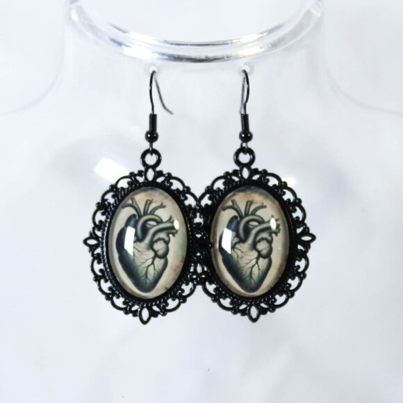 Handmade Jewelry - Victorian Anatomical Heart Cameo Earrings Tan Background